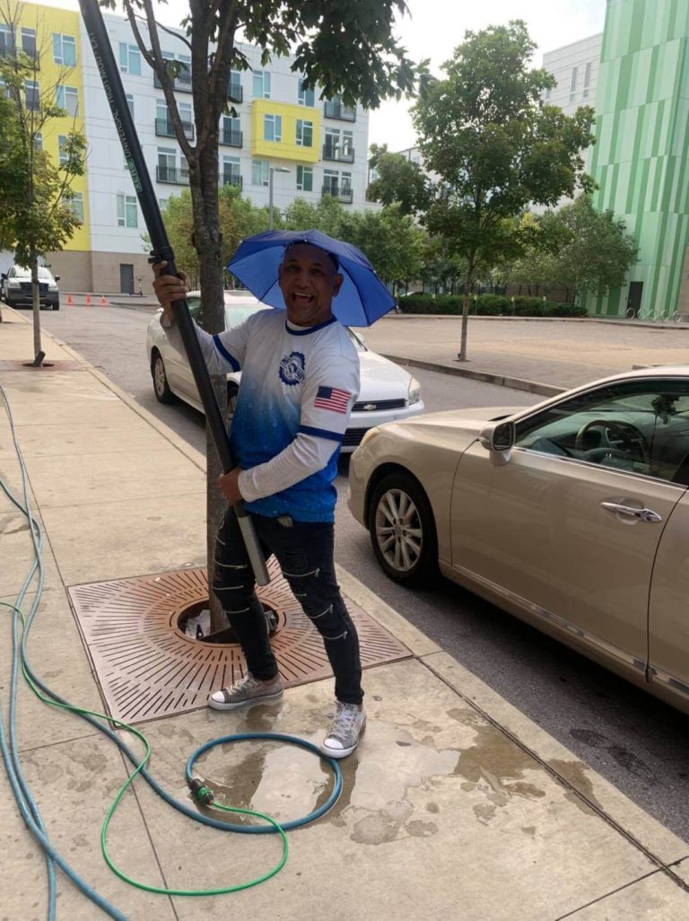 Using a Pressure Washer Wand to clean exterior windows in indianapolis