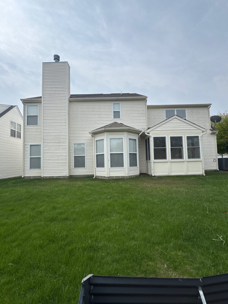 Soft washing mildew from vinyl siding in Indiana