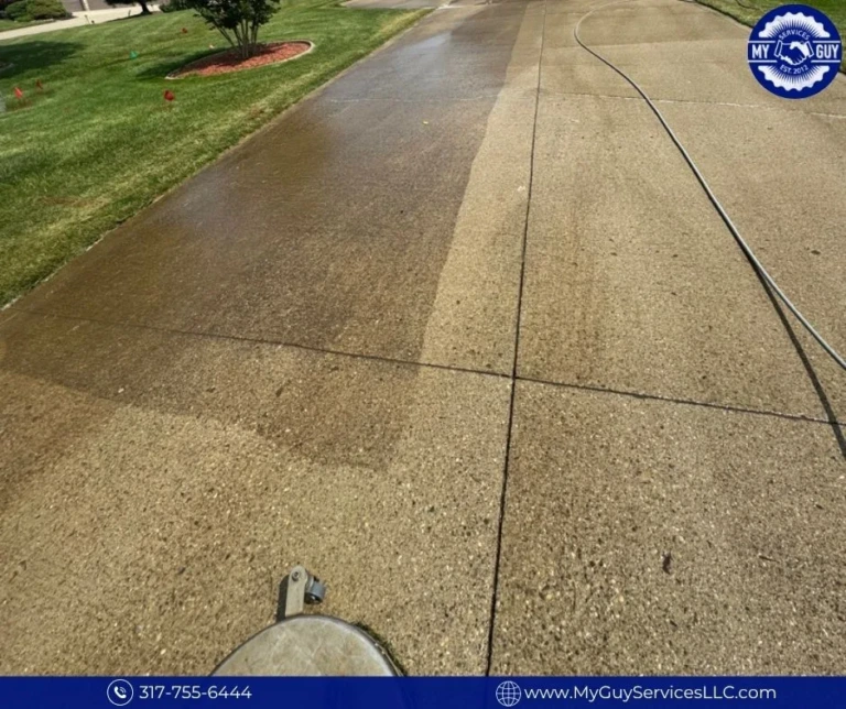 Concrete driveway cleaning in a Carmel subdivision