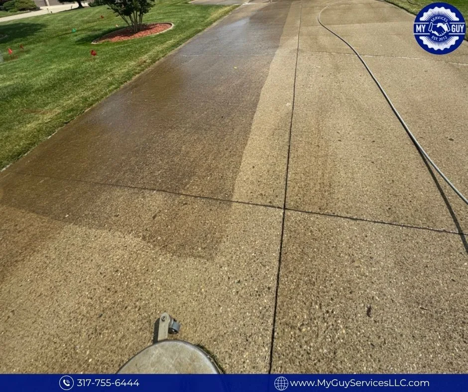 Concrete driveway cleaning in a Carmel subdivision