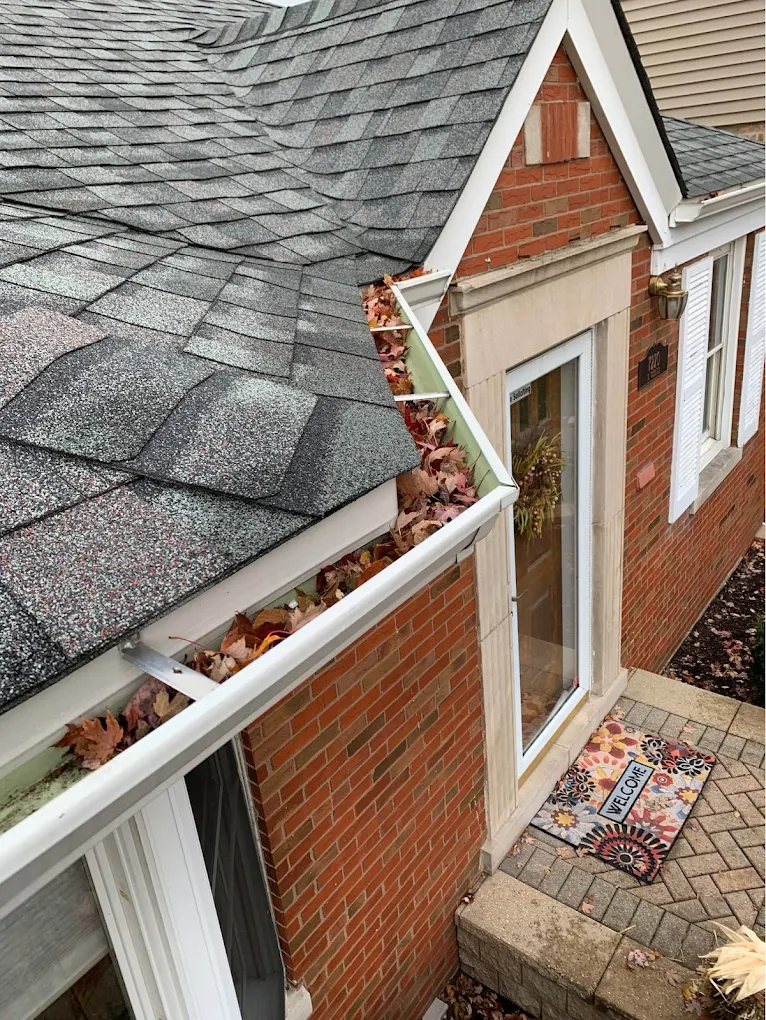 Pressure washing vs soft washing Carmel brick homes exterior