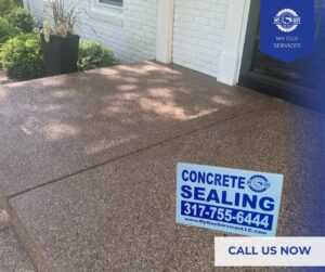 shiny concrete driveway after professional concrete sealing service