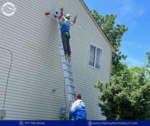 house washing service technicians cleaning home exterior siding Indianapolis